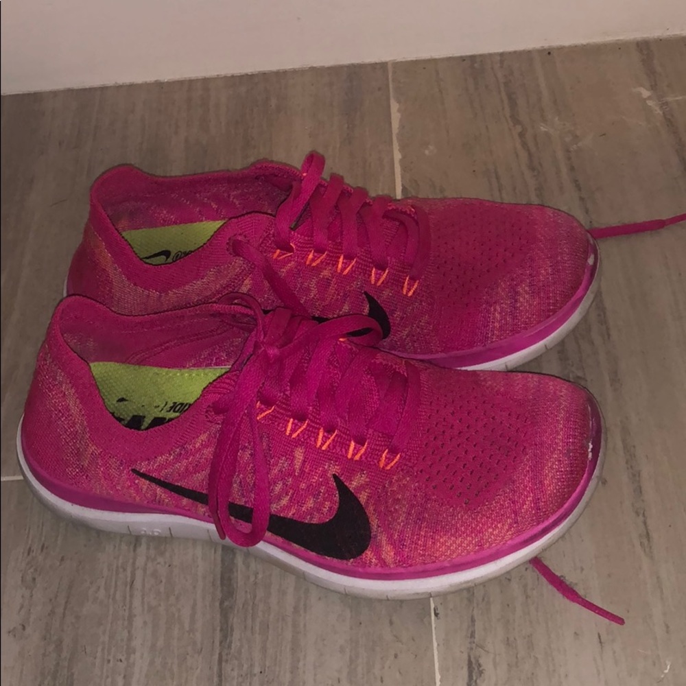 Hot pink nike free runs